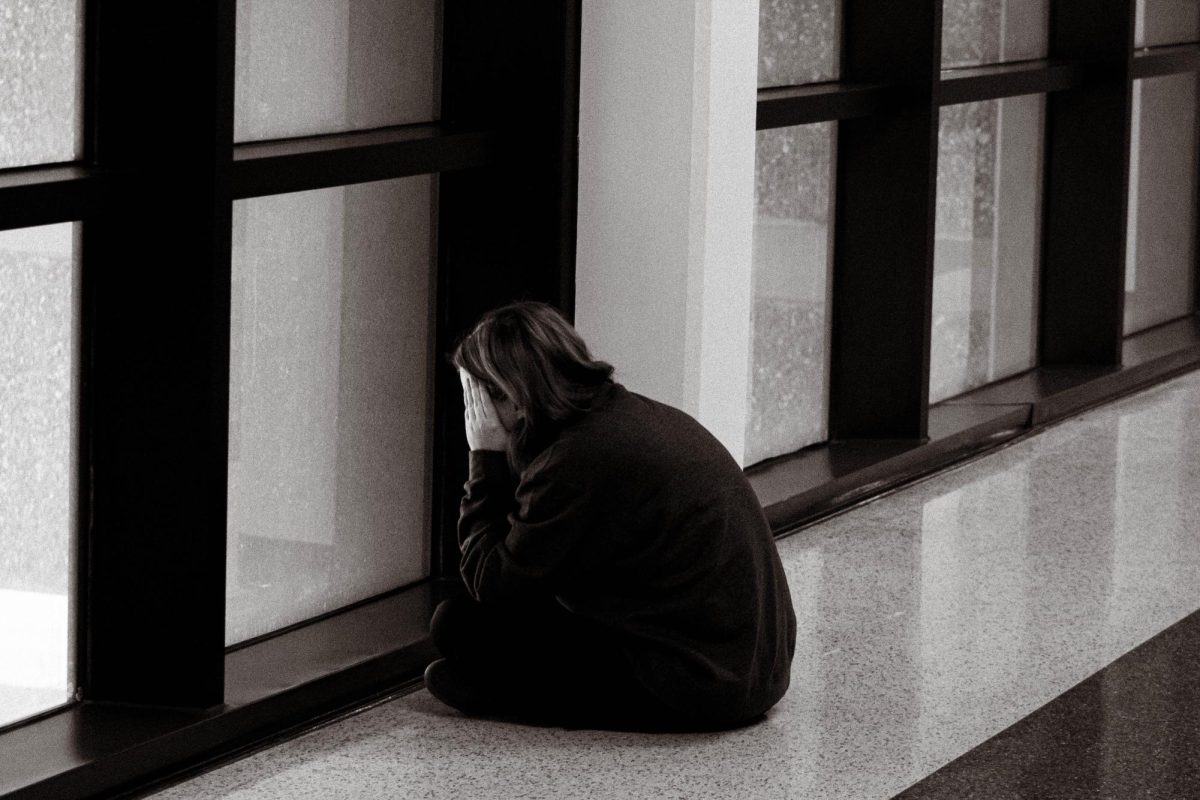 Worried student thinking about her future.