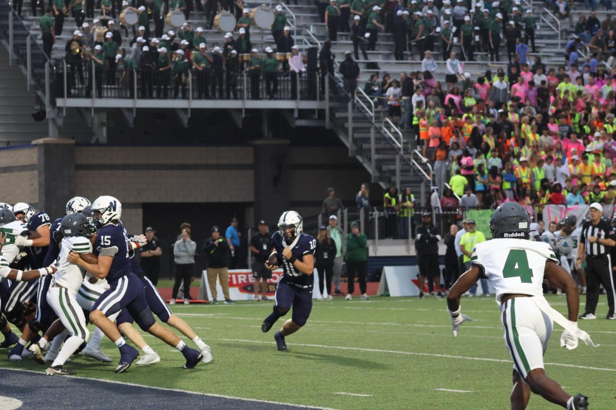 Number 10 running the ball into the end zone.