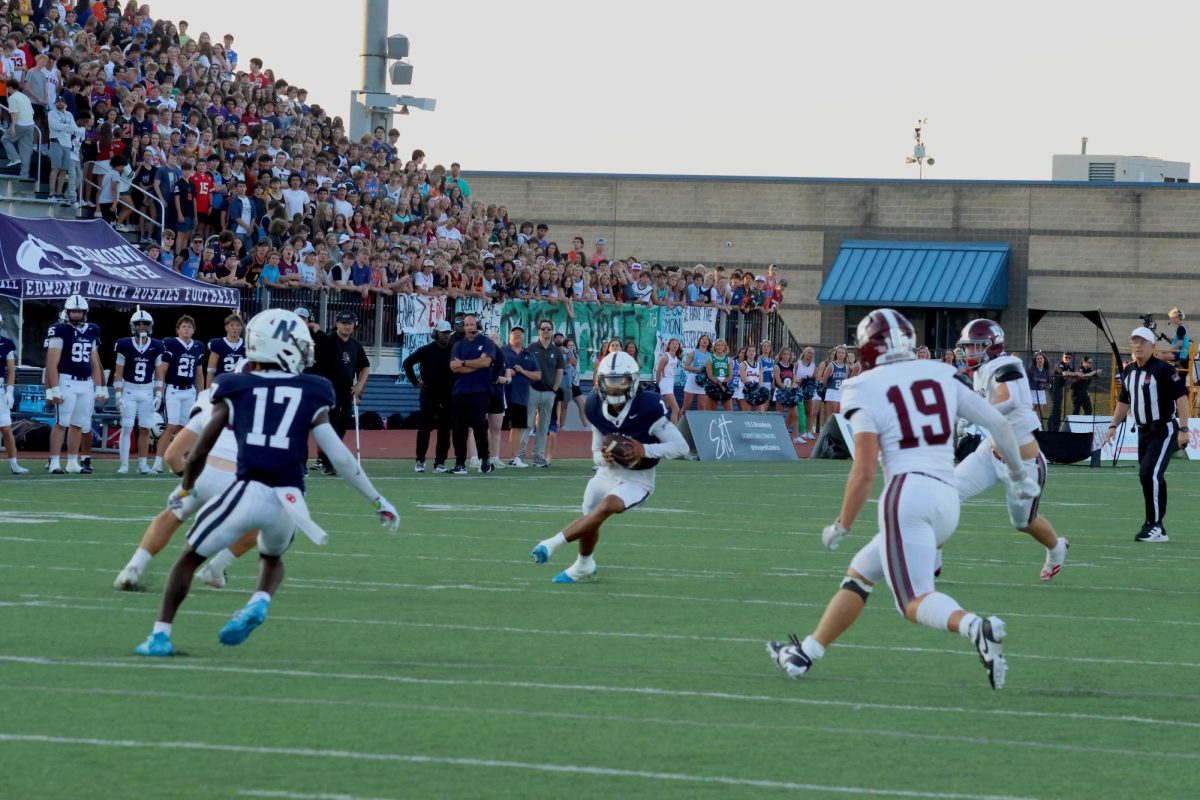 Huskies running the ball into the end zone.