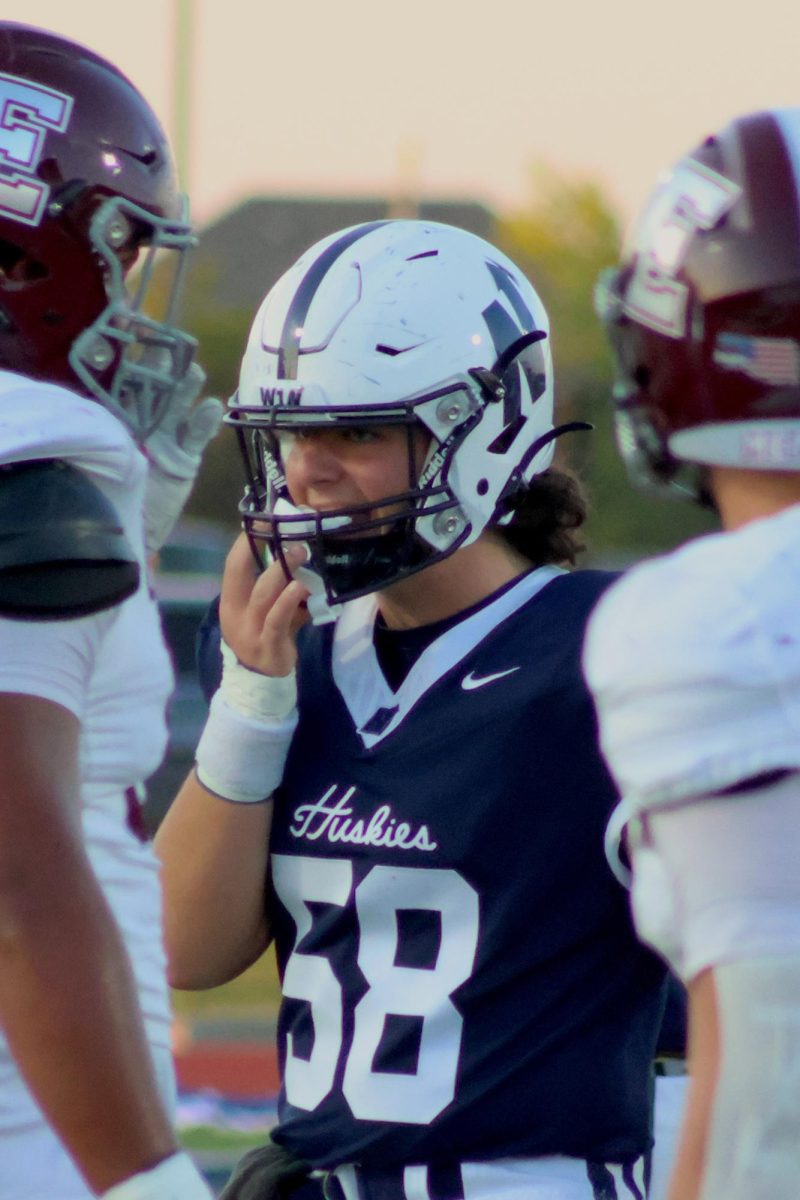 Number 58 preparing for the next play.