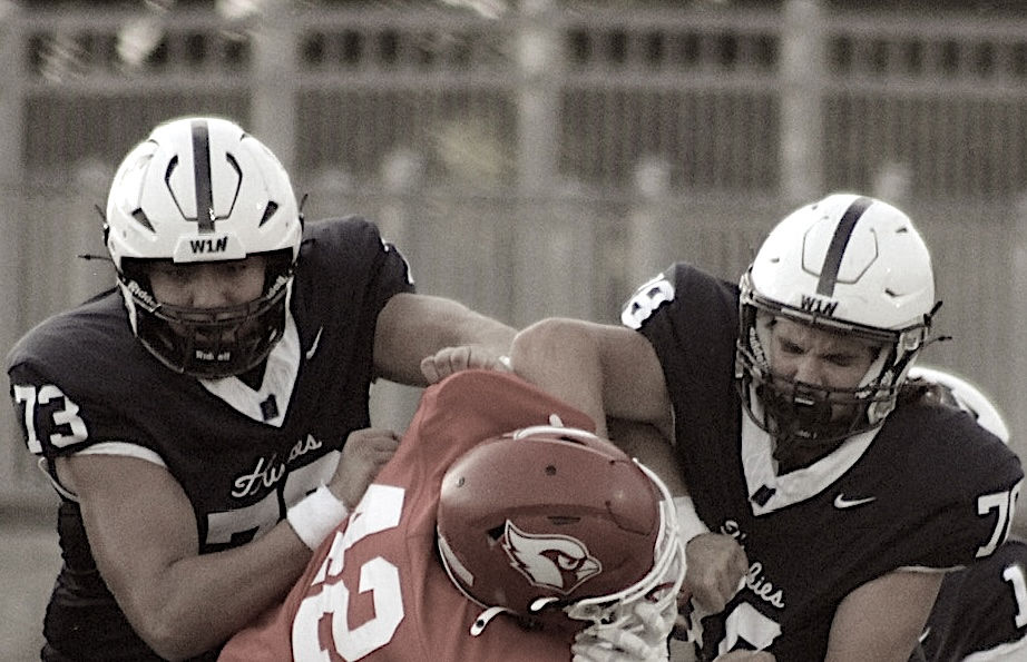 Players 73 and 78 blocking on the offensive line
