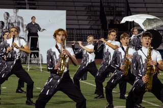 There are a total of 12 different instrument sections in the Edmond North High School Marching Band. Each section plays a crucial role in the band.