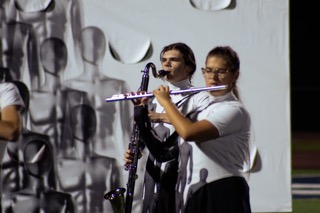 Another solo, by Emily Price, was on a flute. All four solos were by different people on different instruments. Each instrument was completely different from the last, bringing unique sounds to the forefront for the audience.