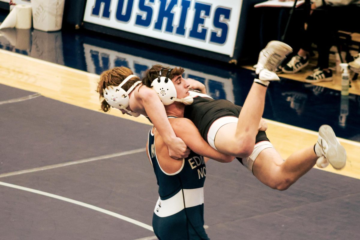 Senior Will Deutschlander picking up his opponent, but slowly set him down so that the referee wouldn't stop the match due to a potentially dangerous call.