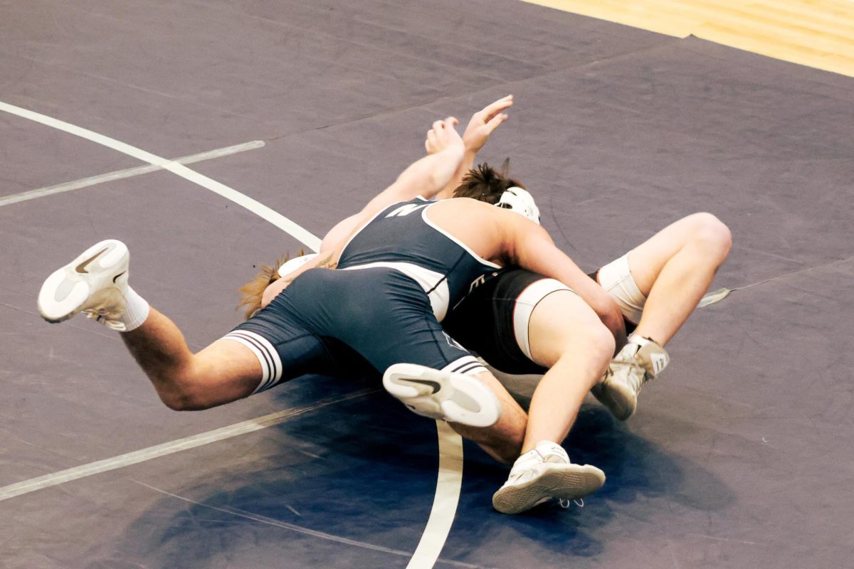 Edmond North faced Norman High in their first wrestling dual. Junior Madden Skidmore helped the team off to a strong start by getting the fall, earning 6 points.